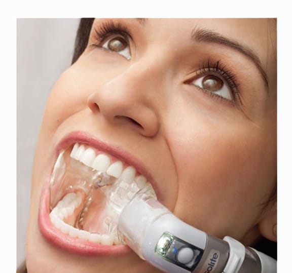 Woman with isolite in mouth